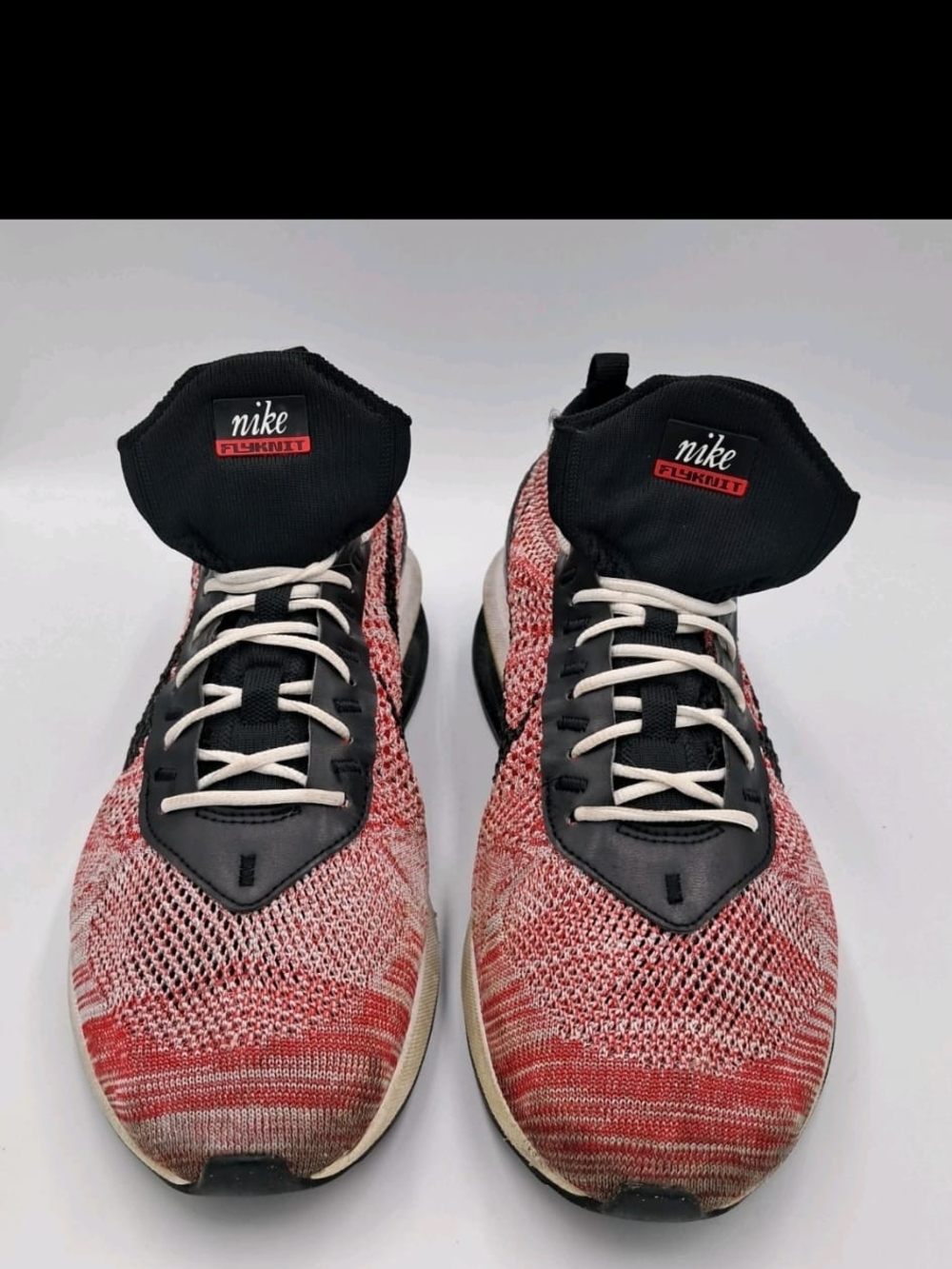 Nike Men’s Red and Black Flyknit Running Shoes